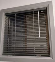 Dark gray color matches my window trim well