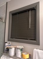 Dark gray color matches my window trim well